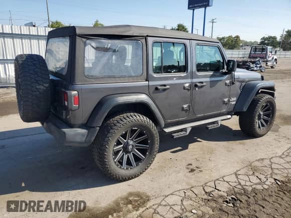 2021 Jeep Wrangler Unlimited Willys Sport with VIN 1C4HJXDG3MW530966, listed as a Copart auction lot 80820095 with 132,075 mi miles and Clean title. Bid and sale history available at DreamBid. Image 3.