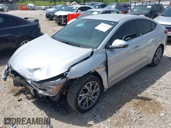 2019 Hyundai Elantra SEL z VIN KMHD84LF4KU864915, wystawiony jako IAAI lot #42264637 z przebiegiem 69 046 mil mil oraz . Historia ofert i sprzedaży dostępna na DreamBid. Obrazek 2.