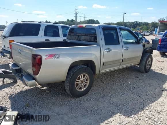 2010 Chevrolet Colorado 1LT z VIN 1GCJTCDE0A8138854, wystawiony jako IAAI lot #43450584 z przebiegiem 275 389 mil mil oraz . Historia ofert i sprzedaży dostępna na DreamBid. Obrazek 4.