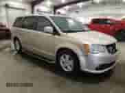 2013 Dodge Grand Caravan Crew with VIN 2C4RDGDG6DR700029, listed as a Copart auction lot 69057705 with 64,797 mi miles and Salvage title. Bid and sale history available at DreamBid. Image 4.