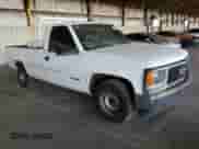 1998 GMC Sierra 1500 z VIN 1GTEC14M6WZ850008, wystawiony jako Copart lot #68911324 z przebiegiem 110 409 mil mil oraz Szkoda całkowita • Salvage title. Historia ofert i sprzedaży dostępna na DreamBid. Obrazek 4.