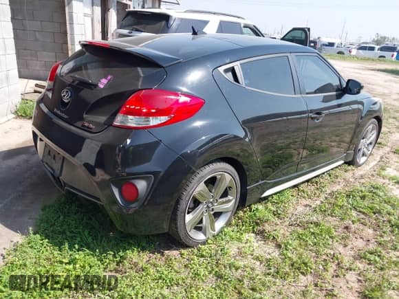 2013 Hyundai Veloster Turbo с VIN KMHTC6AE7DU124293, выставлен на аукционе IAAI как лот 41924836 с пробегом 141 685 миль миль и . История ставок и продаж доступна на DreamBid. Изображение 4.