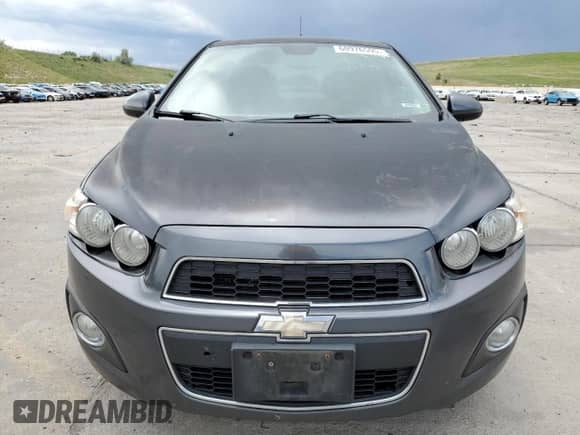 2013 Chevrolet Sonic LTZ с VIN 1G1JE5SH0D4102525, выставлен на аукционе Copart как лот 60976595 с пробегом 138 420 миль миль и Списание • Salvage title. История ставок и продаж доступна на DreamBid. Изображение 5.