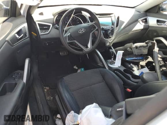 2013 Hyundai Veloster w/Gray Int z VIN KMHTC6AD9DU162101, wystawiony jako Copart lot #71926675 z przebiegiem 44 981 mil mil oraz Szkoda całkowita • Salvage title. Historia ofert i sprzedaży dostępna na DreamBid. Obrazek 8.