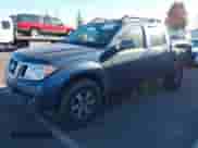 2013 Nissan Frontier SV with VIN 1N6AD0EV6DN731096, listed as a IAAI auction lot 41424331 with 121,534 mi miles and . Bid and sale history available at DreamBid. Image 2.