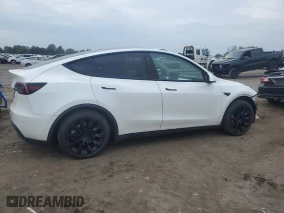 2023 Tesla Model Y Long Range с VIN 7SAYGAEE4PF693730, выставлен на аукционе Copart как лот 81366555 с пробегом 37 187 миль миль и Списание • Salvage title. История ставок и продаж доступна на DreamBid. Изображение 3.