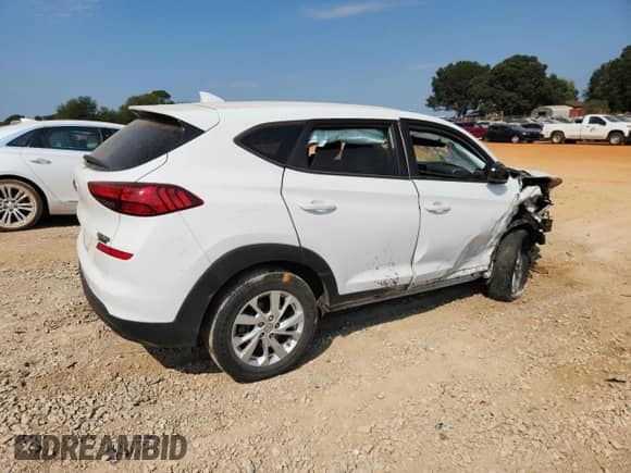2019 Hyundai Tucson SE с VIN KM8J23A46KU842883, выставлен на аукционе Copart как лот 81144025 с пробегом 74 595 миль миль и Списание • Salvage title. История ставок и продаж доступна на DreamBid. Изображение 3.