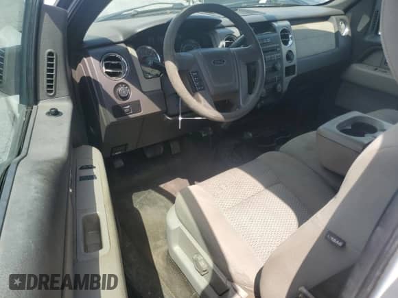 2009 Ford F-150 XL with VIN 1FTRF14W59KB31694, listed as a Copart auction lot 63646015 with 208,958 mi miles and Salvage title. Bid and sale history available at DreamBid. Image 8.