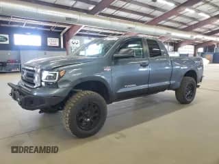 2010 Toyota Tundra с VIN 5TFUY5F17AX095642, выставлен на аукционе Copart как лот 68995395 с пробегом 264 200 миль миль и Чистый • Clean title. История ставок и продаж доступна на DreamBid. Изображение 1.