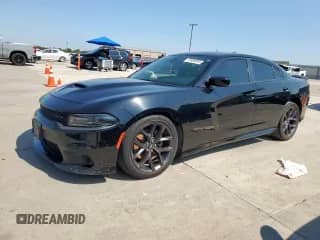 2021 Dodge Charger GT z VIN 2C3CDXHG7MH658934, wystawiony jako Copart lot #70906055 z przebiegiem 55 516 mil mil oraz Szkoda całkowita • Salvage title. Historia ofert i sprzedaży dostępna na DreamBid. Obrazek 1.