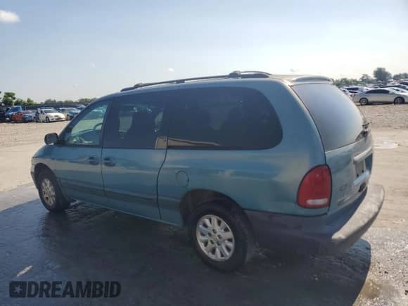 1999 Dodge Caravan SE with VIN 2B4GP44G9XR204463, listed as a Copart auction lot 64301385 with 291,785 mi miles and Salvage title. Bid and sale history available at DreamBid. Image 2.