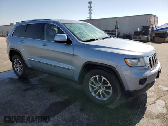 2012 Jeep Grand Cherokee Laredo с VIN 1C4RJEAT6CC305743, выставлен на аукционе Copart как лот 68207395 с пробегом 176 629 миль миль и Чистый • Clean title. История ставок и продаж доступна на DreamBid. Изображение 4.