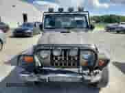 2003 Jeep Wrangler Rubicon с VIN 1J4FA69S13P310131, выставлен на аукционе Copart как лот 59139025 с пробегом 260 349 миль миль и Списание • Salvage title. История ставок и продаж доступна на DreamBid. Изображение 5.