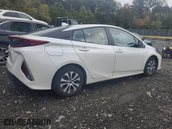 2022 Toyota Prius Limited with VIN JTDKAMFP5N3225876, listed as a Copart auction lot 86515265 with 40,117 mi miles and Salvage title. Bid and sale history available at DreamBid. Image 3.