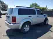 2008 Dodge Nitro SXT with VIN 1D8GU28K88W288879, listed as a Copart auction lot 69745245 with 129,571 mi miles and Salvage title. Bid and sale history available at DreamBid. Image 3.