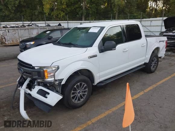 2019 Ford F-150 XLT z VIN 1FTEW1EP0KKD88077, wystawiony jako IAAI lot #43125919 z przebiegiem 80 967 mil mil oraz . Historia ofert i sprzedaży dostępna na DreamBid. Obrazek 2.