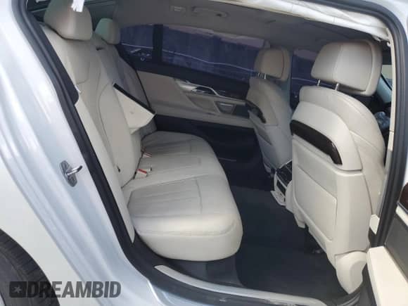 2017 BMW 7 Series 740i with VIN WBA7E2C31HG740674, listed as a Copart auction lot 62059545 with 97,551 mi miles and Salvage title. Bid and sale history available at DreamBid. Image 10.