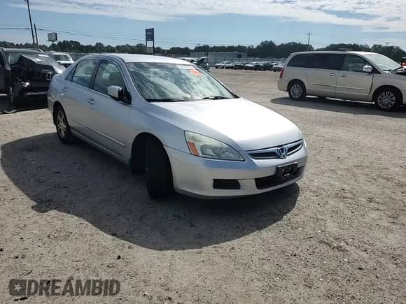 2006 Honda Accord LX SE z VIN 1HGCM56366A145547, wystawiony jako Copart lot #70960175 z przebiegiem 147 033 mil mil oraz Szkoda całkowita • Salvage title. Historia ofert i sprzedaży dostępna na DreamBid. Obrazek 13.