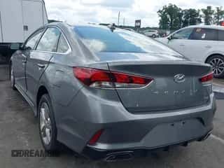 2019 Hyundai Sonata Sport z VIN 5NPE34AFXKH730981, wystawiony jako IAAI lot #42734945 z przebiegiem 92 362 mil mil oraz . Historia ofert i sprzedaży dostępna na DreamBid. Obrazek 3.