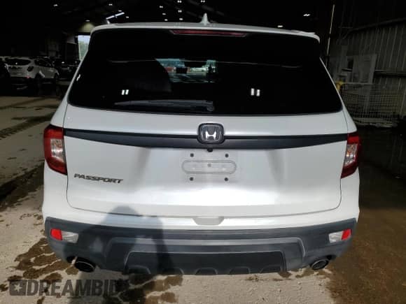 2021 Honda Passport EX-L с VIN 5FNYF7H54MB014209, выставлен на аукционе Copart как лот 64942915 с пробегом 89 504 миль миль и Списание • Salvage title. История ставок и продаж доступна на DreamBid. Изображение 6.