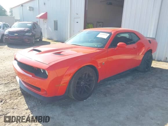 2022 Dodge Challenger R/T Scat Pack Widebody z VIN 2C3CDZFJ3NH254704, wystawiony jako IAAI lot #42648108 z przebiegiem 14 405 mil mil oraz . Historia ofert i sprzedaży dostępna na DreamBid. Obrazek 17.