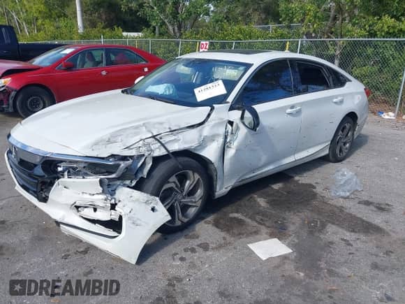 2018 Honda Accord EX-L with VIN 1HGCV2F57JA017839, listed as a IAAI auction lot 41281323 with 83,986 mi miles and . Bid and sale history available at DreamBid. Image 2.