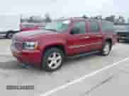 2009 Chevrolet Suburban LTZ z VIN 1GNFK36309J105434, wystawiony jako IAAI lot #42062907 z przebiegiem 132 674 mil mil oraz . Historia ofert i sprzedaży dostępna na DreamBid. Obrazek 2.