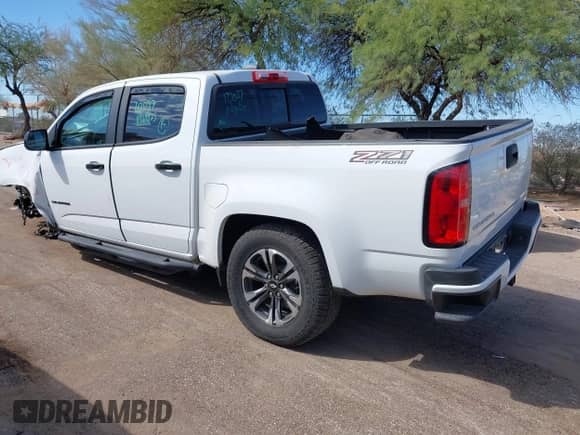 2021 Chevrolet Colorado 4WD Z71 z VIN 1GCGTDEN4M1257292, wystawiony jako IAAI lot #43368583 z przebiegiem 67 924 mil mil oraz . Historia ofert i sprzedaży dostępna na DreamBid. Obrazek 3.
