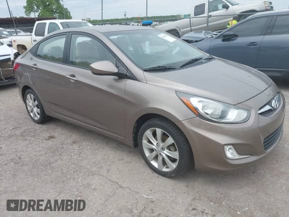 2012 Hyundai Accent GLS z VIN KMHCU4AE8CU240375, wystawiony jako IAAI lot #42184903 z przebiegiem 116 785 mil mil oraz . Historia ofert i sprzedaży dostępna na DreamBid. Obrazek 1.