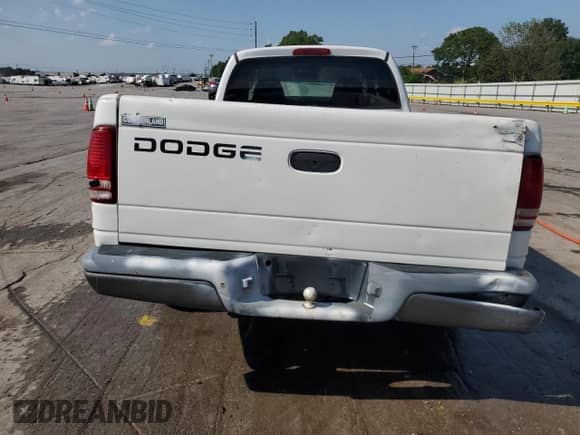 2002 Dodge Dakota с VIN 1B7GL12X72S690701, выставлен на аукционе Copart как лот 62176795 с пробегом 217 197 миль миль и Списание • Salvage title. История ставок и продаж доступна на DreamBid. Изображение 6.