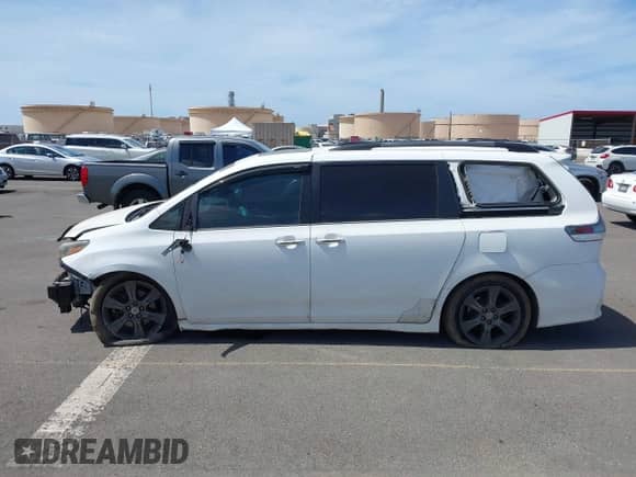 2015 Toyota Sienna SE with VIN 5TDXK3DC2FS621891, listed as a IAAI auction lot 42832318 with 110,420 mi miles and . Bid and sale history available at DreamBid. Image 14.
