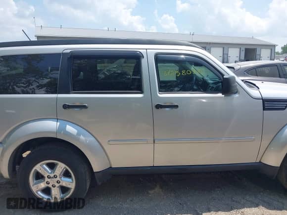 2009 Dodge Nitro SLT with VIN 1D8GU58K69W501539, listed as a IAAI auction lot 42580310 with 160,223 mi miles and . Bid and sale history available at DreamBid. Image 14.