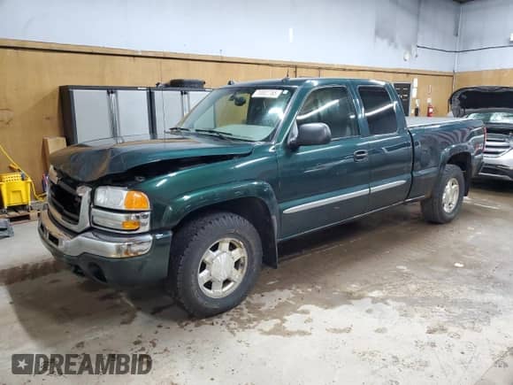 2004 GMC Sierra 1500 SLT z VIN 2GTEK19T941194072, wystawiony jako Copart lot #70002765 z przebiegiem 165 447 mil mil oraz Szkoda całkowita • Salvage title. Historia ofert i sprzedaży dostępna na DreamBid. Obrazek 1.