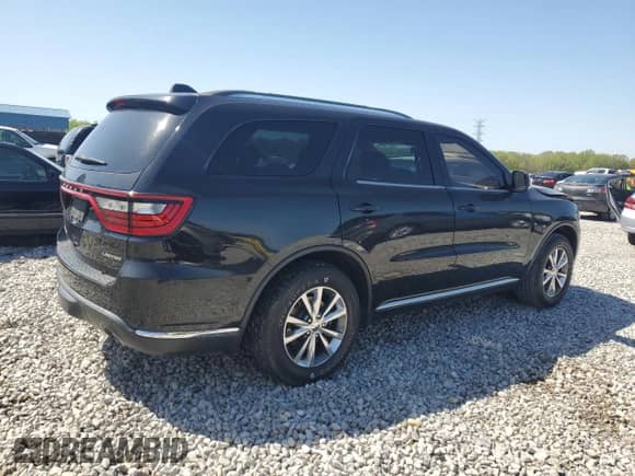 2014 Dodge Durango Limited with VIN 1C4SDJDT6EC558786, listed as a Copart auction lot 52459695 with 158,338 mi miles and Salvage title. Bid and sale history available at DreamBid. Image 3.
