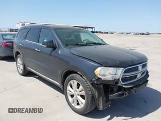 2013 Dodge Durango Crew with VIN 1C4SDHDT5DC637535, listed as a IAAI auction lot 41867982 with 162,569 mi miles and . Bid and sale history available at DreamBid. Image 1.