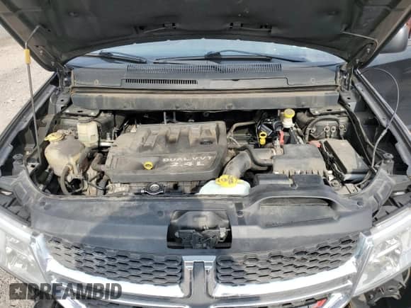 2014 Dodge Journey SE with VIN 3C4PDCAB9ET316849, listed as a Copart auction lot 82078595 with 127,374 mi miles and Salvage title. Bid and sale history available at DreamBid. Image 12.