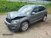 2015 Volkswagen Tiguan S с VIN WVGAV7AX3FW609305, выставлен на аукционе Copart как лот 63859415 с пробегом 147 131 миль миль и Списание • Salvage title. История ставок и продаж доступна на DreamBid. Изображение 1.