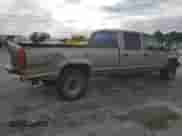 1999 Chevrolet Silverado 3500 z VIN 1GCHK33R4XF096473, wystawiony jako Copart lot #65189104 z przebiegiem 174 416 mil mil oraz Szkoda całkowita • Salvage title. Historia ofert i sprzedaży dostępna na DreamBid. Obrazek 3.