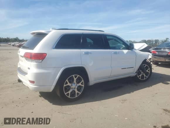 2020 Jeep Grand Cherokee Overland z VIN 1C4RJFCG0LC105379, wystawiony jako Copart lot #85102485 z przebiegiem 73 158 mil mil oraz Szkoda całkowita • Salvage title. Historia ofert i sprzedaży dostępna na DreamBid. Obrazek 3.