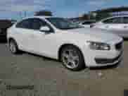 2014 Volvo S60 T5 z VIN YV1612FH7E2275192, wystawiony jako Copart lot #70063675 z przebiegiem 127 396 mil mil oraz Czysty tytuł • Clean title. Historia ofert i sprzedaży dostępna na DreamBid. Obrazek 4.