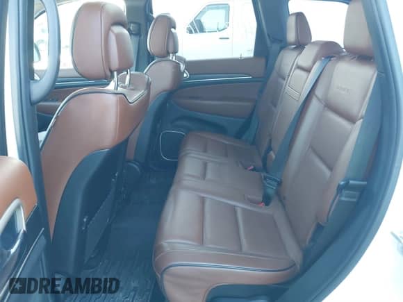 2016 Jeep Grand Cherokee Summit with VIN 1C4RJFJTXGC489631, listed as a IAAI auction lot 41379162 with 97,605 mi miles and . Bid and sale history available at DreamBid. Image 8.