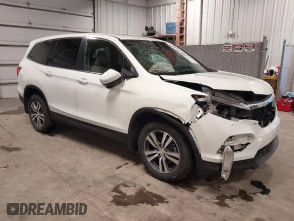 2018 Honda Pilot EX-L z VIN 5FNYF6H5XJB000904, wystawiony jako IAAI lot #43374737 z przebiegiem 166 130 mil mil oraz . Historia ofert i sprzedaży dostępna na DreamBid. Obrazek 1.