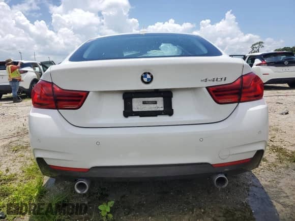 2018 BMW 4 Series 440i with VIN WBA4J5C57JBF07020, listed as a Copart auction lot 67140244 with 20,708 mi miles and Salvage title. Bid and sale history available at DreamBid. Image 6.