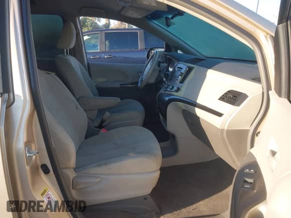 2014 Toyota Sienna L with VIN 5TDZK3DC0ES435998, listed as a IAAI auction lot 43475071 with 69,397 mi miles and . Bid and sale history available at DreamBid. Image 5.