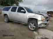 2011 Chevrolet Suburban LT с VIN 1GNSCJE02BR339623, выставлен на аукционе Copart как лот 59632745 с пробегом 220 125 миль миль и Списание • Salvage title. История ставок и продаж доступна на DreamBid. Изображение 4.