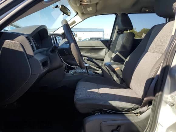 2009 Jeep Grand Cherokee Laredo with VIN 1J8GR48K69C530219, listed as a Copart auction lot 82320295 with 231,364 mi miles and Salvage title. Bid and sale history available at DreamBid. Image 7.