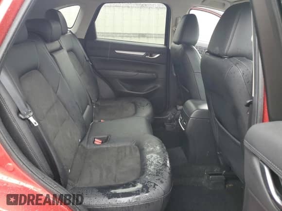 2023 Mazda CX-5 S Select z VIN JM3KFBBM6P0242411, wystawiony jako Copart lot #67057565 z przebiegiem 25 234 mil mil oraz Szkoda całkowita • Salvage title. Historia ofert i sprzedaży dostępna na DreamBid. Obrazek 11.