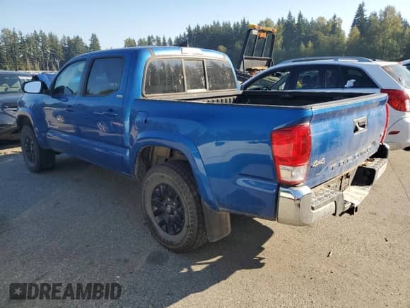 2017 Toyota Tacoma SR5 with VIN 3TMCZ5AN5HM069608, listed as a Copart auction lot 85300495 with 59,494 mi miles and Salvage title. Bid and sale history available at DreamBid. Image 2.