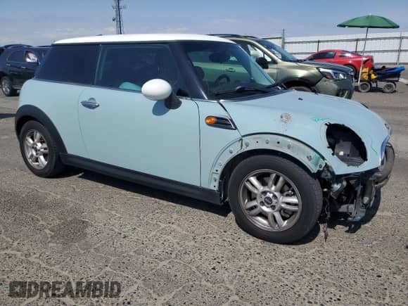 2011 MINI Hardtop with VIN WMWSU3C52BT096248, listed as a Copart auction lot 62008285 with 129,794 mi miles and Salvage title. Bid and sale history available at DreamBid. Image 4.