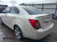 2014 Chevrolet Sonic LTZ with VIN 1G1JE5SB5E4122735, listed as a IAAI auction lot 42327595 with 163,912 mi miles and . Bid and sale history available at DreamBid. Image 3.